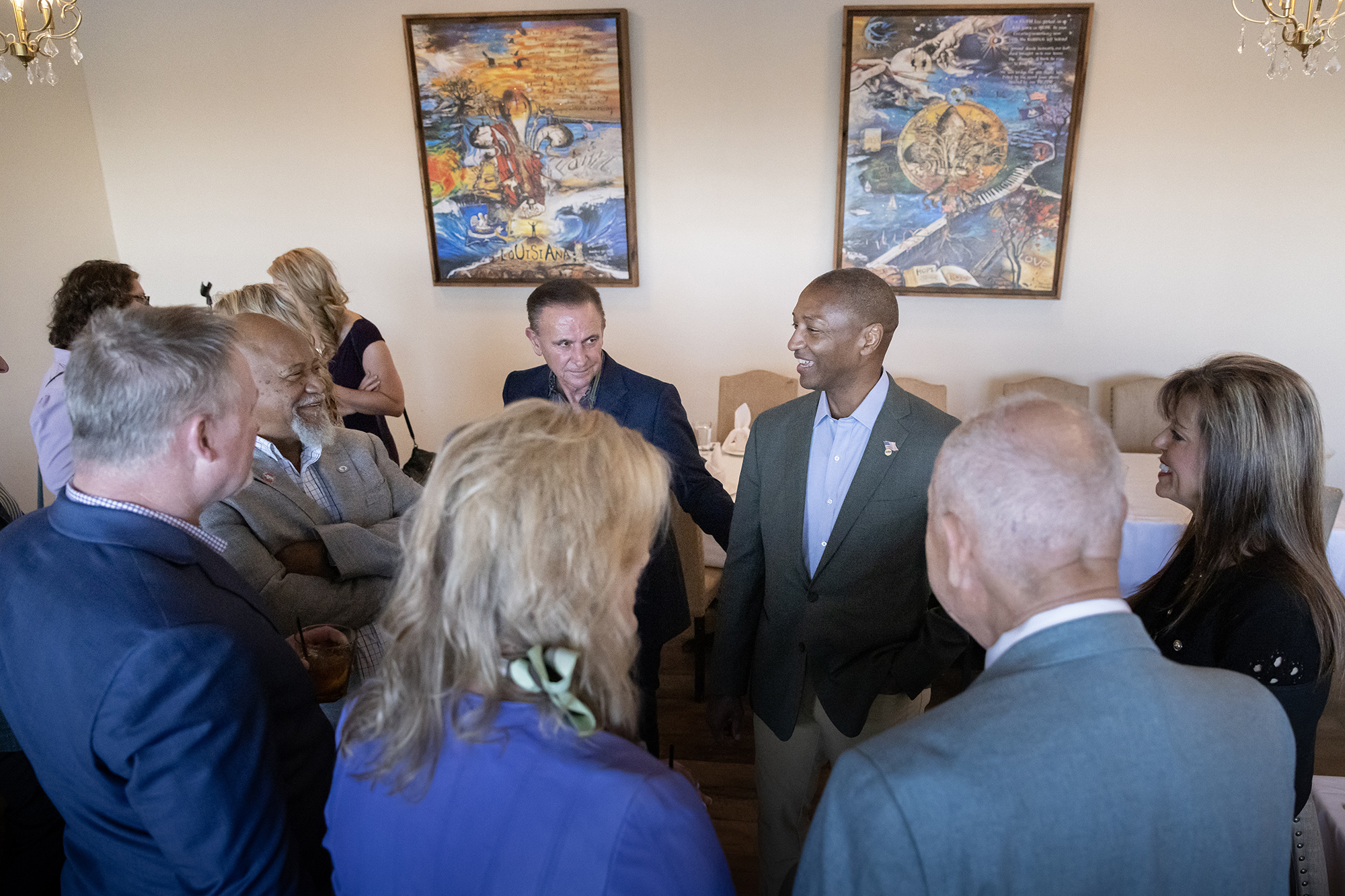 President Tate speaks with a group