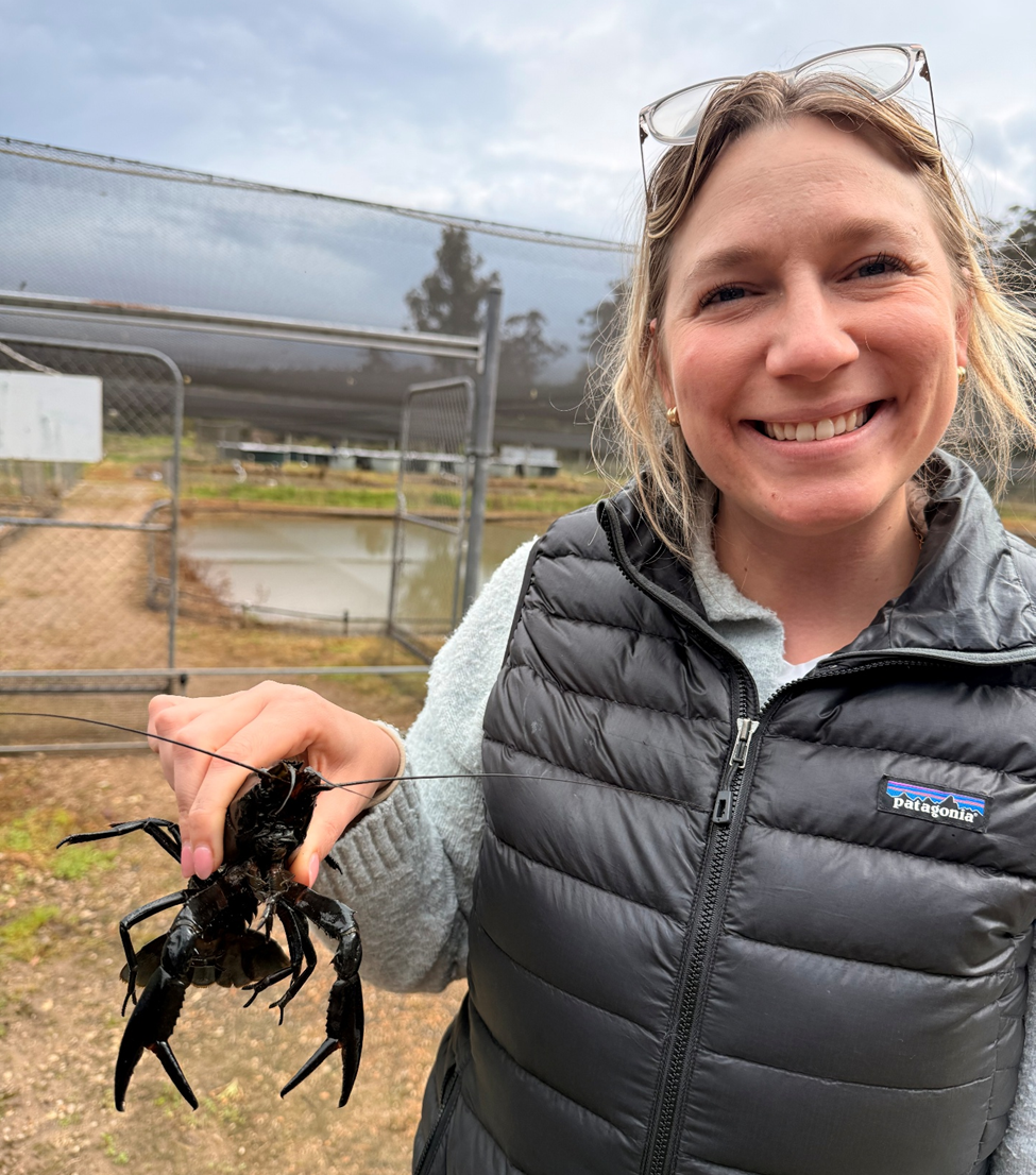 Kaelyn Fogelman holding a crayfish native to southwestern Western Australia