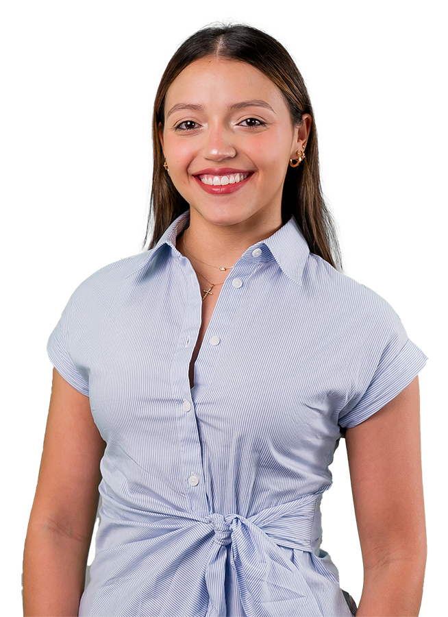 Maria Anzola headshot in a blue wrap shirt, her hair is straight and she smiles warmly.