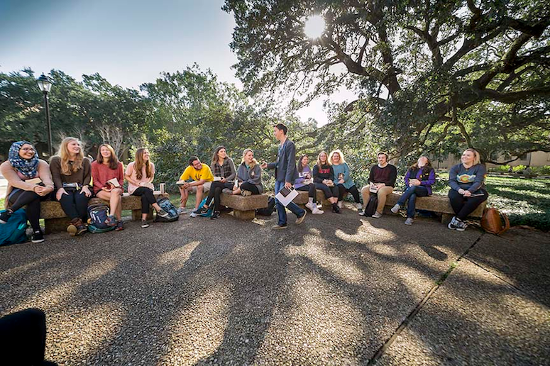 Professor teaching outside in the quad