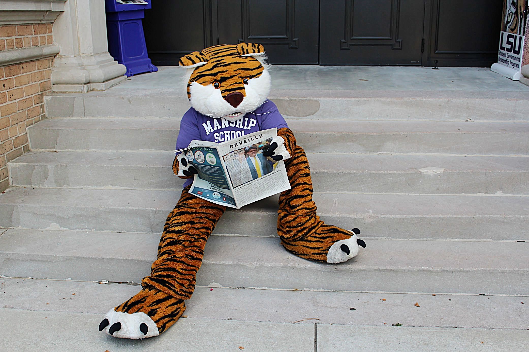 Mike the Tiger reading the Reveille