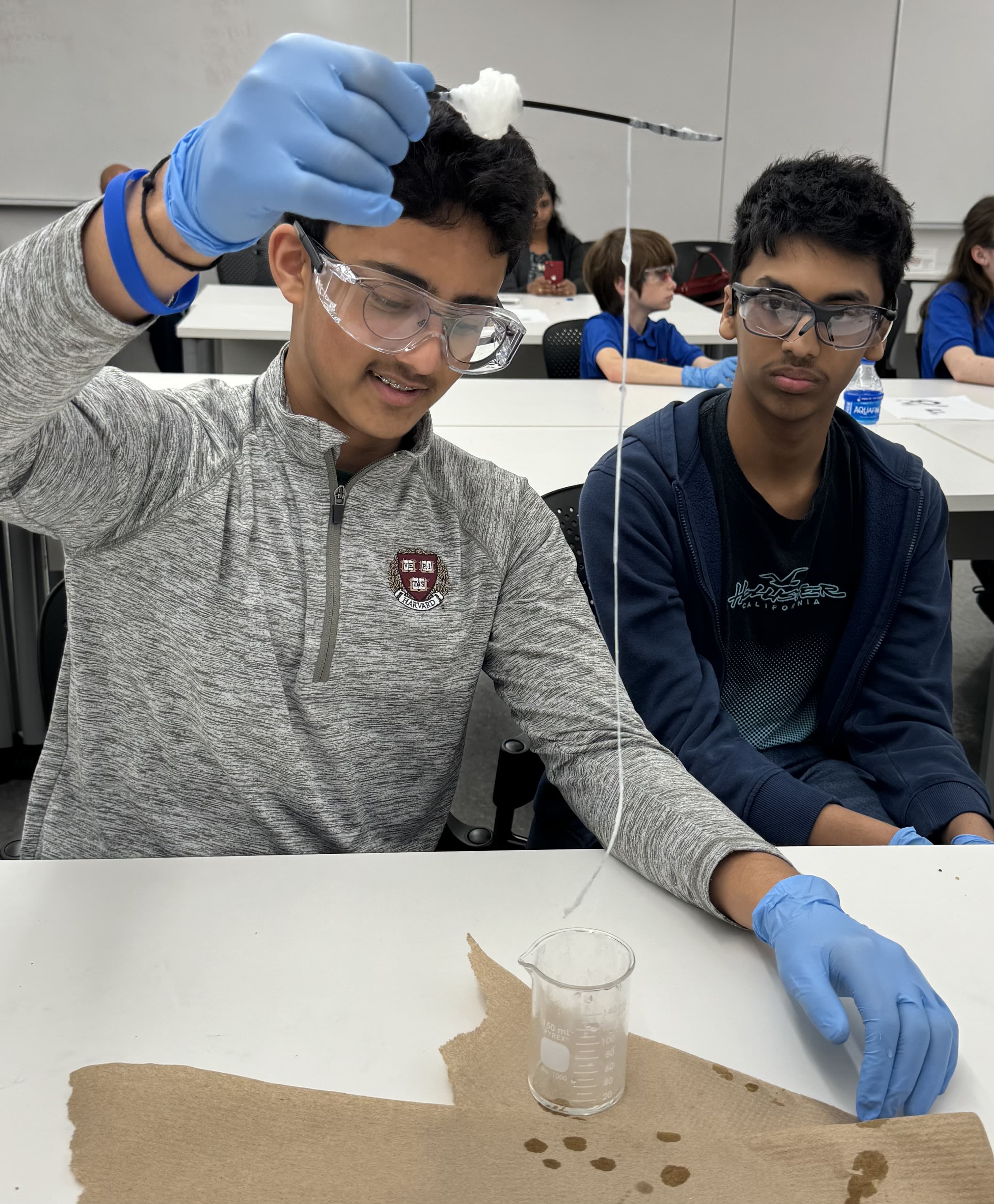 students conducting one of the chemistry demonstrations