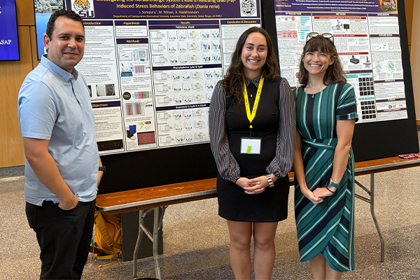 students with research poster
